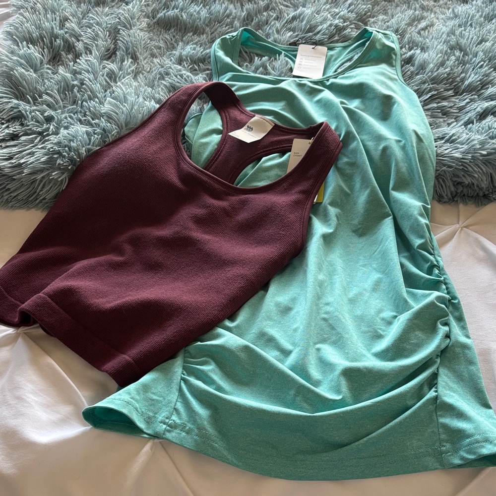 Two NWT workout tank tops.